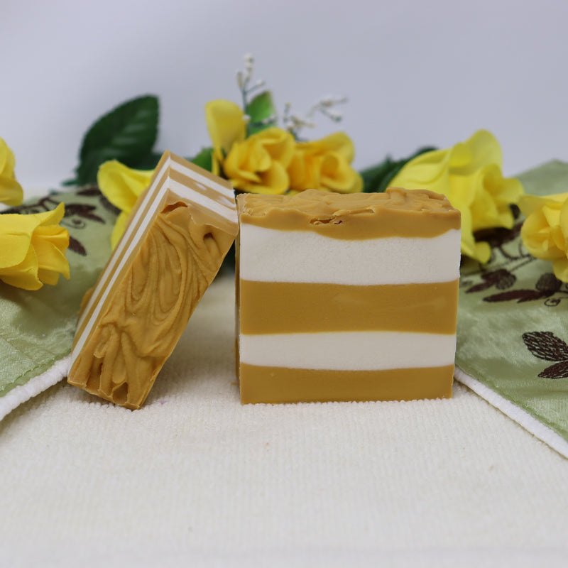 By the Sea Soap Shoppe "Orange Creamsicle" soap has orange and white stripes like a creamsicle, and it also really smells like an orange creamsicle! Vegan, natural ingredients, moisturizing. $7.00 or 3 for $20.00. Handmade in Prince Edward Island, Canada