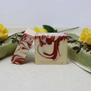 By the Sea Soap Shoppe "Peppermint Patti soap". Soap is white with red swirls and smells just like Peppermint with its peppermint essential oil. Helps you feel positive and energized. Vegan, all-natural ingredients, $7.00 each or 3 for $20.00.  Handmade in Prince Edward Island