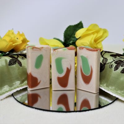 3 mini bars of "By the Sea Soap Shoppe" Apple 'n Spice mini soap. Colour is off white with green and red swirls. Smells like an apple pie! Handmade in Prince Edward Island, vegan, natural ingredients. $3.00 each