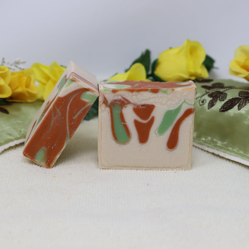 3 mini bars of "By the Sea Soap Shoppe" Apple 'n Spice mini soap. Colour is off white with green and red swirls. Smells like an apple pie! Handmade in Prince Edward Island, vegan, natural ingredients. $3.00 each