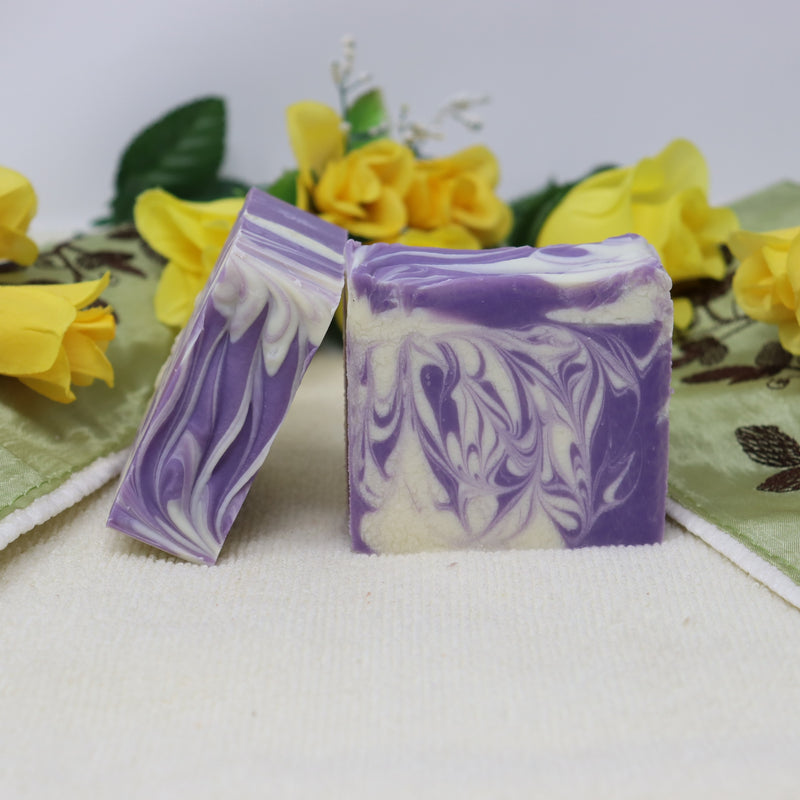 Our By the Sea Soap Shoppe "Lilac and LIlies" soap is white and purple swirls. 