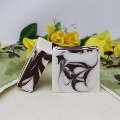 By the Sea Soap Shoppe Patchouli soap is white with brown swirls. Contains Patchouli Essential oil, as well as Sweet Almond oil, Shea butter and Castor oil. This calming soap can help relieve anxiety and anger. Vegan, all natural ingredients. $7.00 or 3 for $20.00. Handmade in Prince Edward Island.