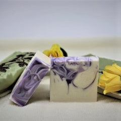 Bars of Luscious Lavender soap coloured purple and white with Lavender essential oil with all its natural benefits. The soap is handmade in Prince Edward Island, Canada. Vegan, all natural ingredients. $7.00 natural ingredients, vegan. $7.00 each